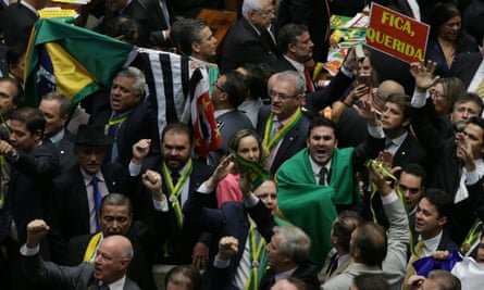 Opposition deputies celebrate the start of the voting during the session on Brazilian president Dilma Rousseff’s impeachment.