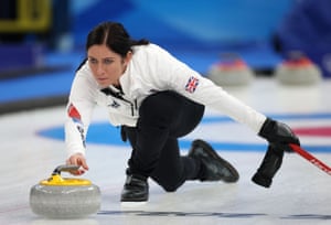 A focused Eve Muirhead sends a stone down the ice.