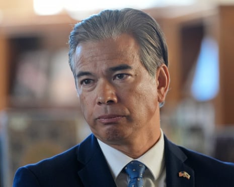 close-up of man wearing navy suit and blue tie