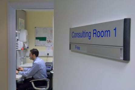A doctor in a consulting room.