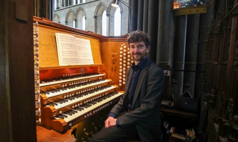 The cathedral’s principal organist, John Challenger, sits at the ‘Father’ Willis organ