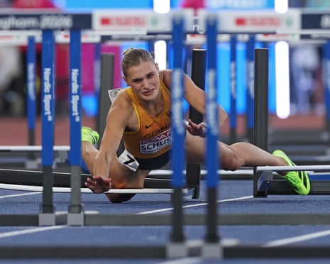 Franziska Schuster of Germany takes a tumble in her women’s 100m hurdles semi-final.