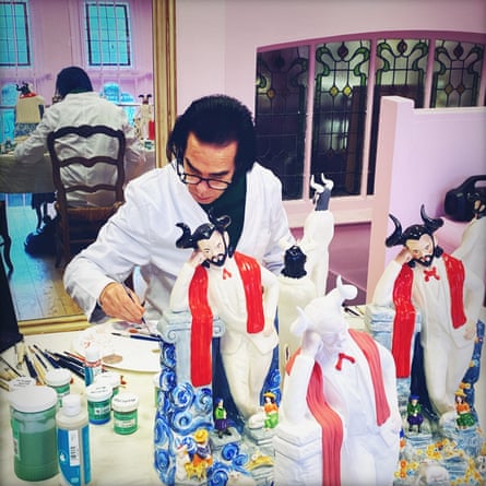 Nick Cave at work on his devil ceramics