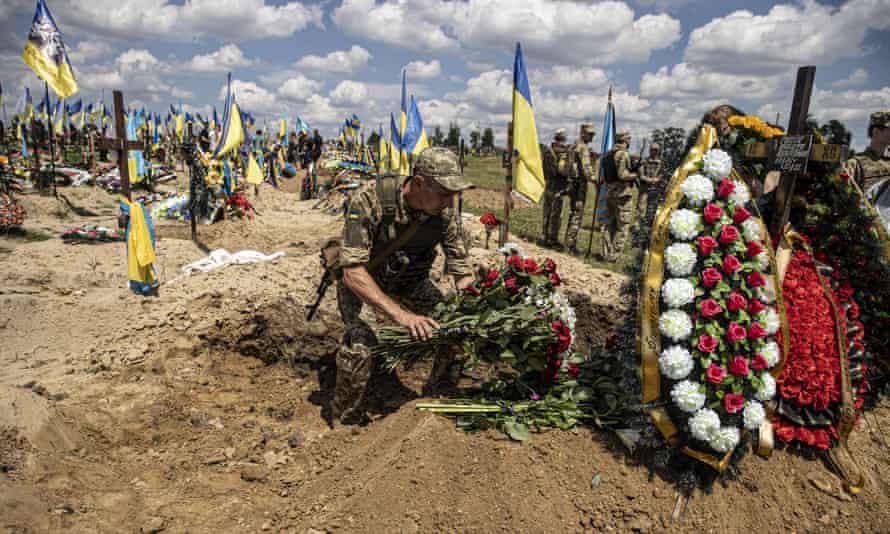 A funeral for two Ukrainian soldiers in Kharkiv yesterday