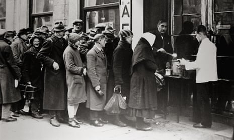 Poverty-struck Vienna residents queue for soup in 1920. 