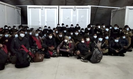 Refugees rescued from the Murat 729 in a migrant camp on Kos, Greece, on 31 October.