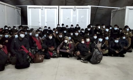 Refugees rescued from the Murat 729 in a migrant camp on Kos, Greece, on 31 October. 