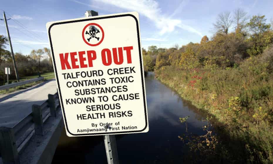 A sign warns of toxic substances in Talfourd Creek at the Aamjiwnaang First Nation in Ontario, Canada.