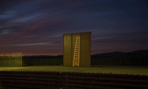 In Tijuana, activist artists led by the Backbone Campaign projected images and slogans on the prototypes.