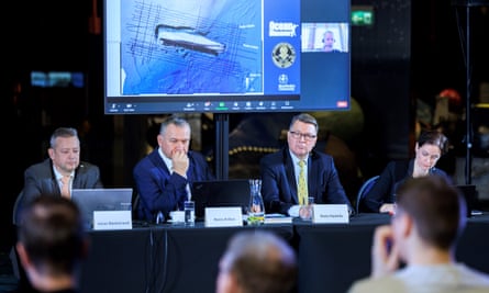Officials discuss the findings at a press conference in Tallinn.