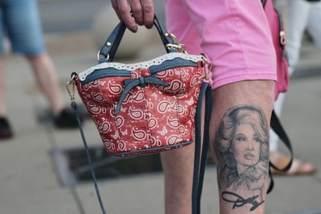 A Dolly Parton fan in Nashville sports a tattoo of the star on their leg.