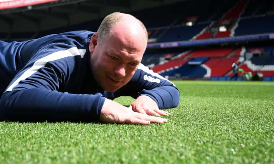 Jonathan Calderwood checking the pitch at Parc des Princes stadium in Paris in 2016.