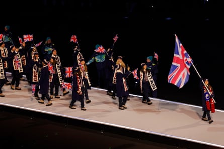 Lilah Fear holds the Union Flag as she leads Great Britain during the opening ceremony