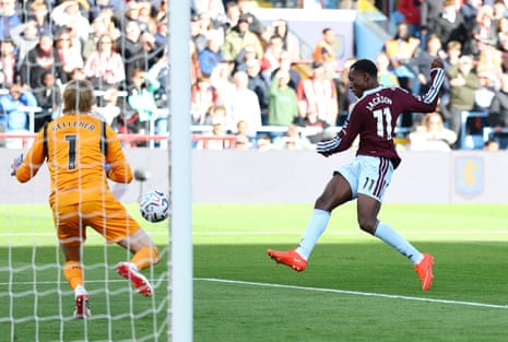 Aston Villa's Nicolas Jackson scores their first goal past Brentford's keeper Caoimhin Kelleher.