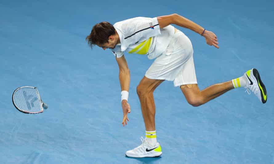 Daniil Medvedev smashes his racket in frustration as the match slips away.