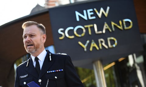 Matt Jukes, in police uniform, addresses media outside New Scotland Yard