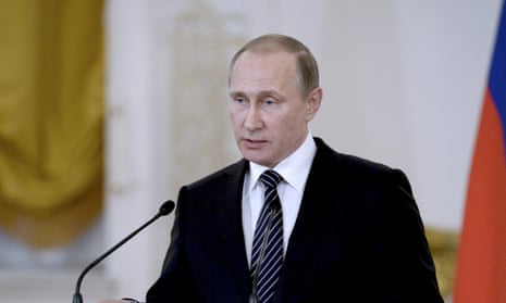 Vladimir Putin delivers a speech during a ceremony at the Kremlin for soldiers returning from Syria.