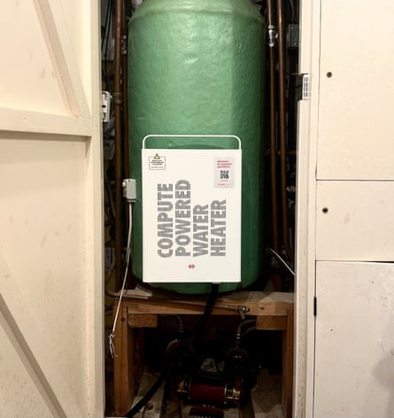 A heata unit in a cupboard in a home
