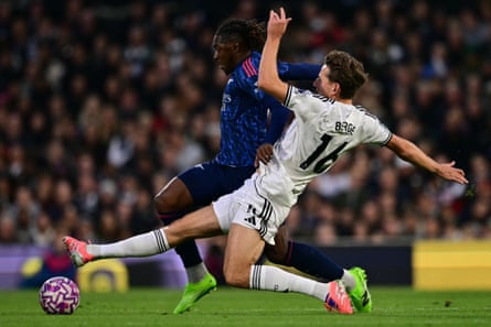 Eberechi Eze vies with Sander Berge for the ball