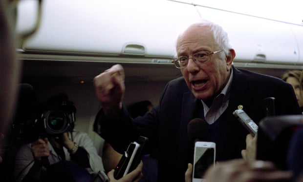Bernie Sanders on campaign plane
