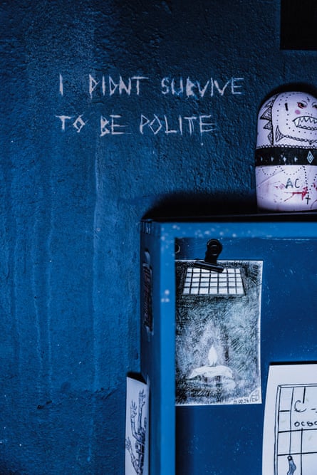 text etched into a wall reads ‘I didn’t survive to be polite’