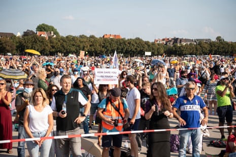 Demonstrators gather during a demonstration against coronavirus restrictions at the Theresienwiese in Munich, Bavaria, Germany, on 12 September 2020. Around 8,000 demonstrators took part in the demonstration, which was against the current measures to contain the spread of coronavirus.