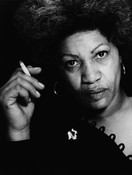 a woman holding a cigarette in portrait