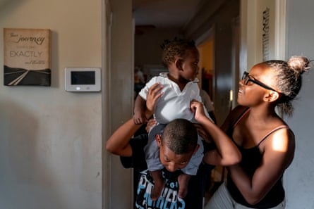 Tajaé Redden, 13, right, plays with her nephews Damontez Sharp, 9, and Lamarco Sharp Jr., 10 months, at their home in St. Louis on Thursday, Sept. 12, 2019. The family lives in north St. Louis, which has long been plagued by gun violence. At least 13 children have died of gunshot wounds in St. Louis city this year, and six children in St. Louis Country have been killed by gunfire.