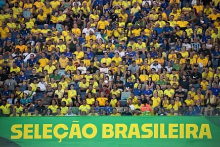 Brazil fans watch their side take on Venezuela at the Arena Pantanal stadium in 2023.