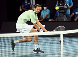 Daniil Medvedev at the net.