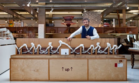 Thomas Heatherwick with the original store model for Harvey Nichols