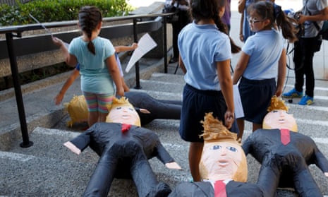 US-born children of immigrants drag Donald Trump piñatas during a voter-registration drive in California in 2016. 
