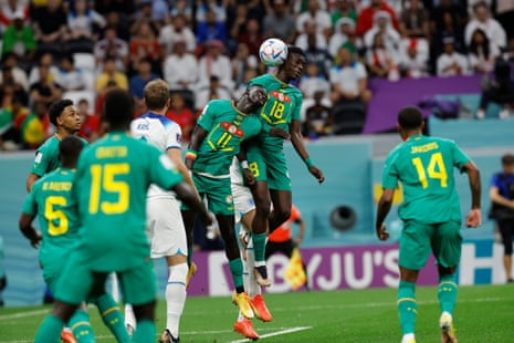 Senegal clear their lines after the England free-kick.