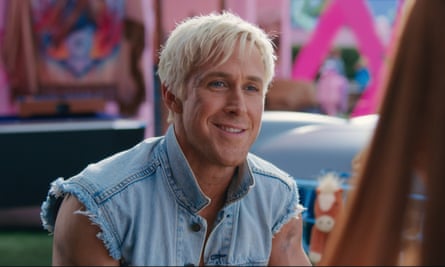 blond man in a denim vest