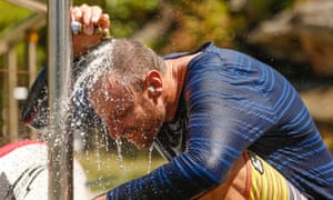 Surfer Brenton Fisher cools off on Tamarama beach in Sydney on Sunday.