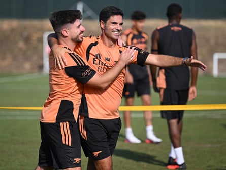 Mikel Arteta on the training ground with Arsenal in Girona, and first-team coach Miguel Molina