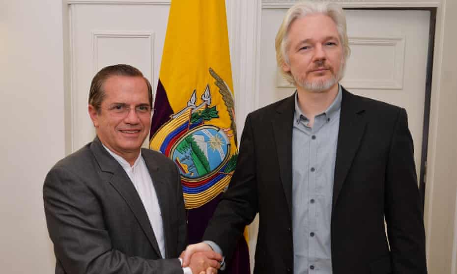 WikiLeaks founder Julian Assange (R) with Ecuadorian foreign minister Ricardo Patino after a press conference in the Ecuadorian embassy in 2014.