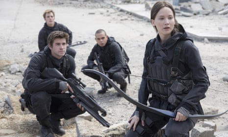 Crowded market … Jennifer Lawrence as Katniss Everdeen and Liam Hemsworth, foreground, as Gale Hawthorne in The Hunger Games: Mockingjay - Part 2.
