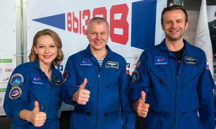 Russian cosmonaut Oleg Novitsky (C), actress Yulia Peresild and film director Klim Shipenko following their return from the International Space Station