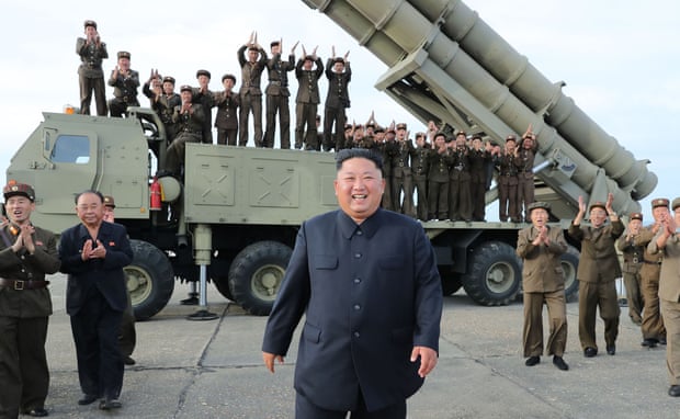 Kim Jong-un smiles after the test firing of Saturday’s missile system.
