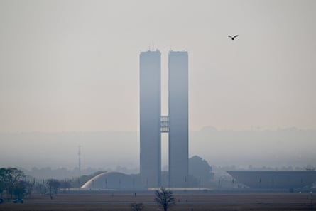 The National Congress building in Brasília is partially covered by smoke from the fire affecting the Brasília national park on 16 September 2024.