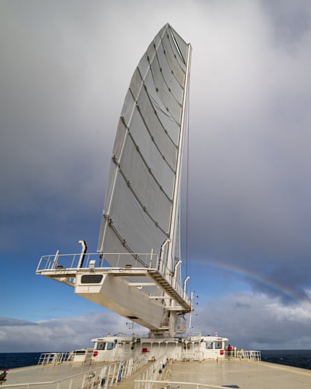 A large white sail at the front of a ship