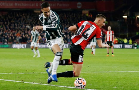 Manchester United’s Antony attempts to get past Sheffield United’s Luke Thomas.