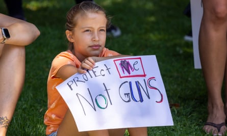 A student holds a sign for a gun control rally at the March for Our Lives protest in Los Angeles, California.