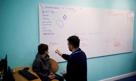 Brooklyn, 10, listens to a tutor at Explore Learning in Bradford
