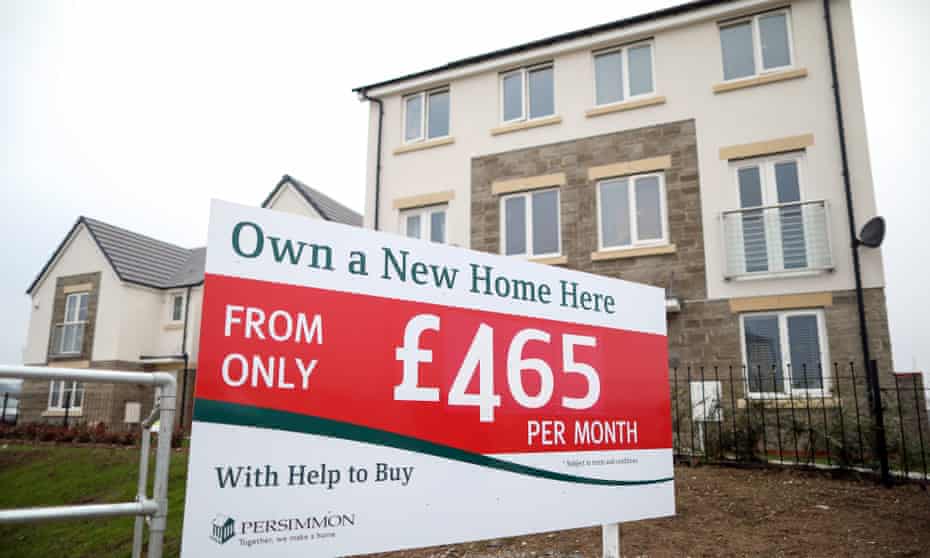 A sign advertising the government’s help-to-buy scheme outside a completed house at a Persimmon site in Weston-Super-Mare
