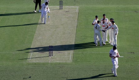 Crawley walks off after feathering Michael Neser behind, but he and Joe Root had put on 117 for the third wicket and saved England.