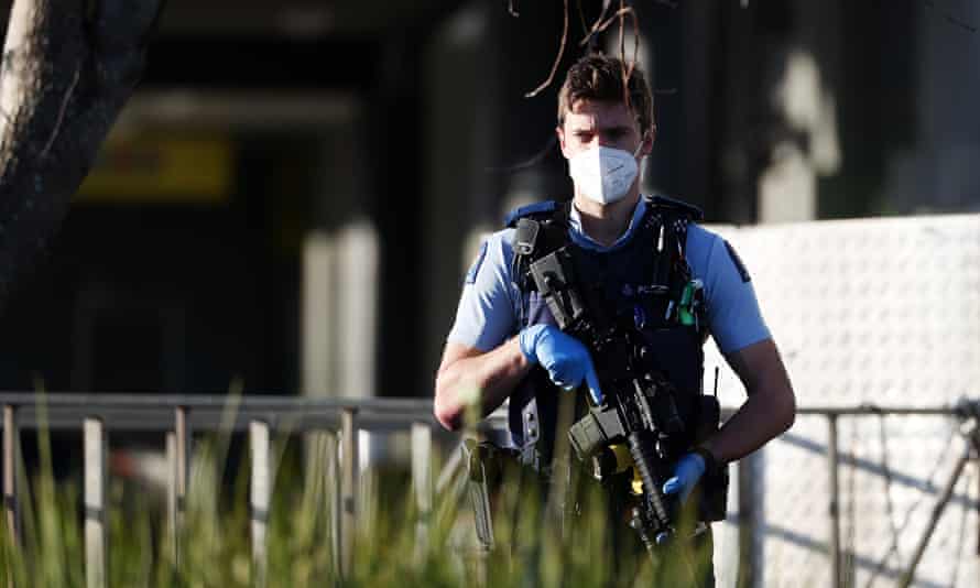 A police officer on duty at Countdown Lynmall the morning after the terrorist attack on a supermarket in Auckland, New Zealand.