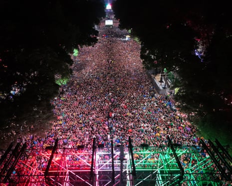 An aerial shot of fans at the Angel of Independence during a celebration after Mexico's victory against Ecuador.