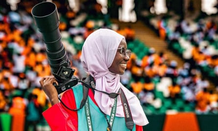 Sarjo Baldeh with a long-lens camera at the Afcon 2023 in Ivory Coast